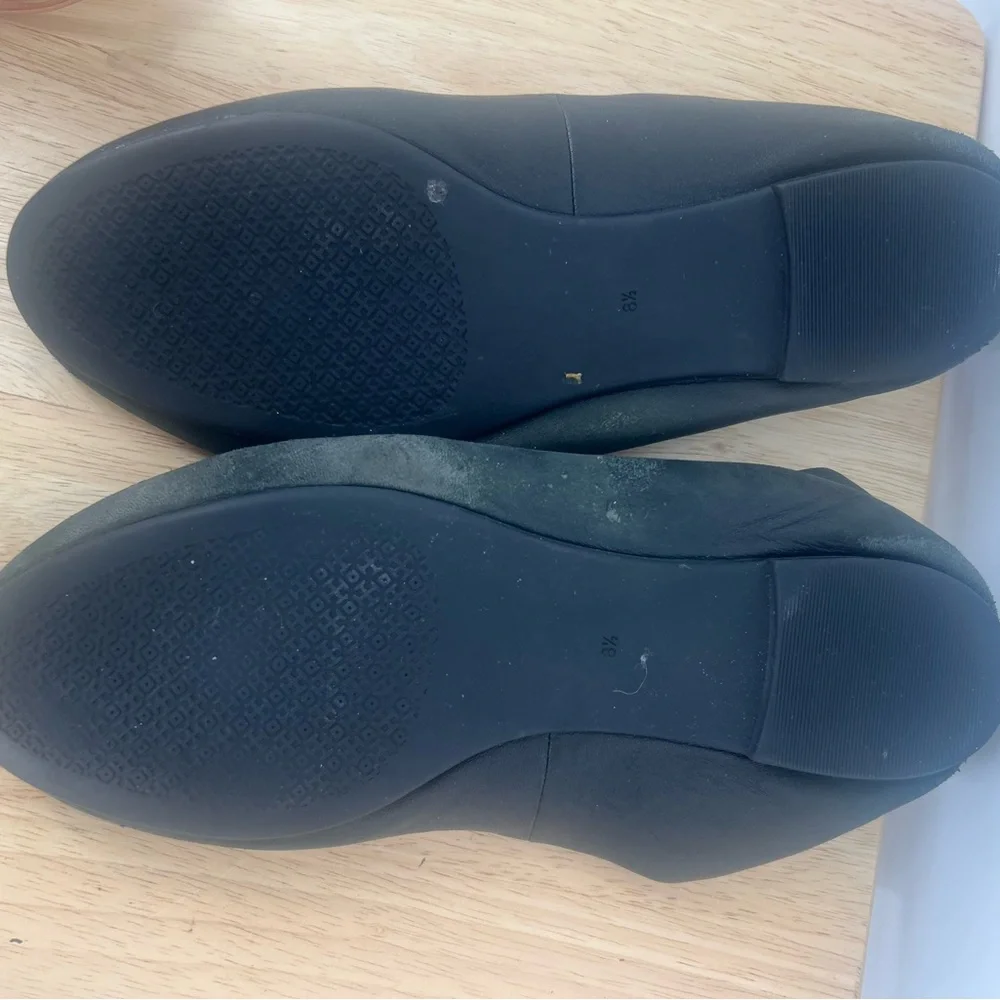Tory Burch Black Loafers with Gold Emblem